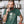 Load image into Gallery viewer, Man enjoying coffee wearing a funny grim reaper t-shirt from Shirty Store