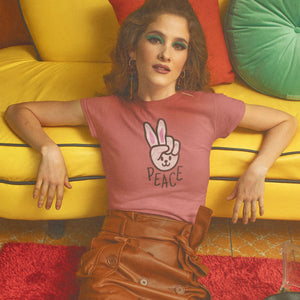 Woman in 70's retro setting wearing a vintage worn bunny peace sign t-shirt from Shirty Store