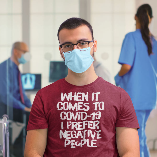 Man in mask wearing funny sarcastic t-shirt  when it comes to COVID-19 I prefer negative people from Shirty Store