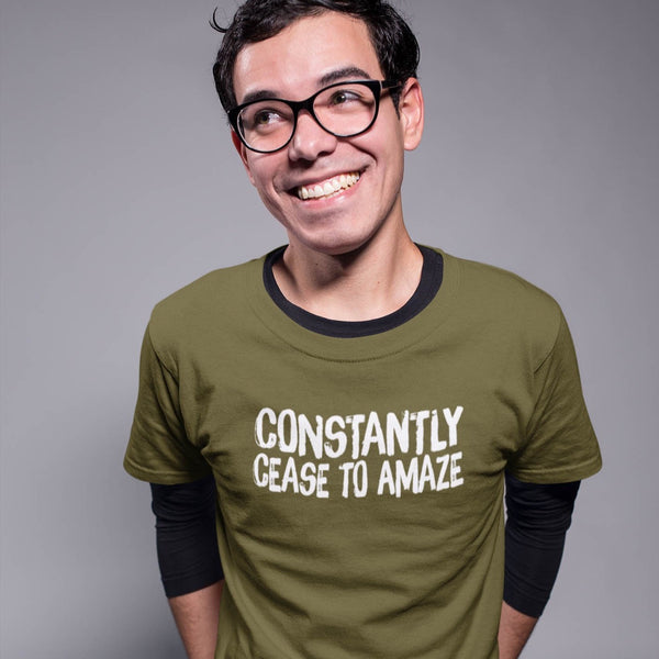 Guy wearing sarcastic Constantly Cease To Amaze t-shirt from Shirty Store
