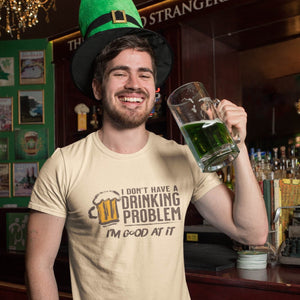 Man drinking green beer wearing funny I don't have a drinking problem, I'm good at it t-shirt from Shirty Store