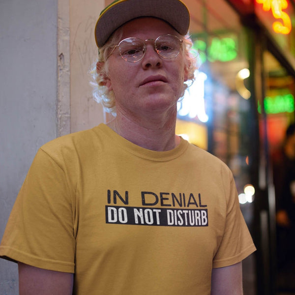 Man wearing sarcastic t-shirt In denial do not disturb from Shirty Store
