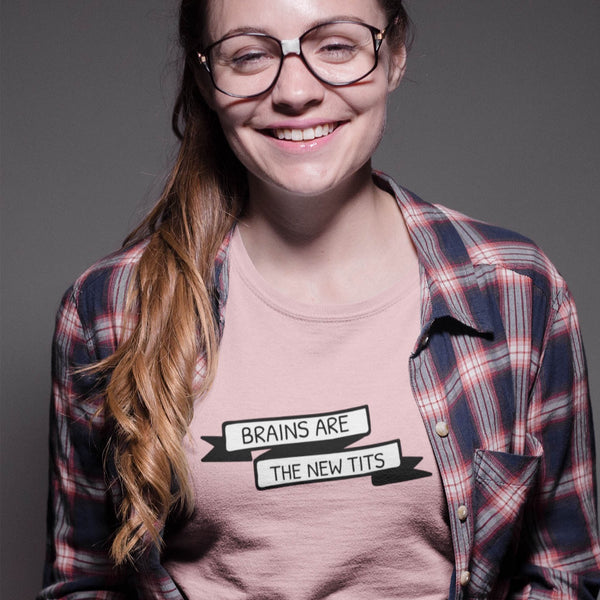 Woman wearing sarcastic Brains are the new tits t-shirt from Shirty Store