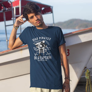 Guy leaning on boat wearing funny Dead Pirates t-shirt from Shirty Store