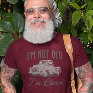 Senior man wearing sarcastic I'm not old I'm classic t-shirt from Shirty Store