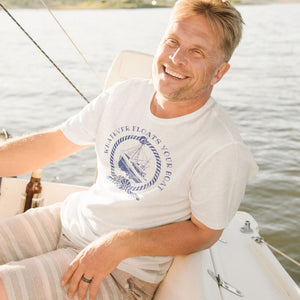 Man on boat wearing funny sarcastic Whatever Floats Your boat t-shirt from Shirty Store