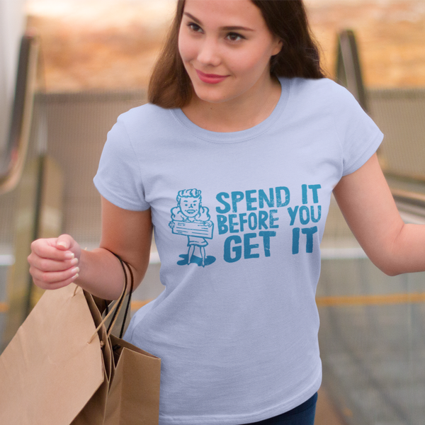 Woman shopping wearing a funny t-shirt for women spend it before you get it