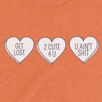 Close up of sarcastic hearts on chest women's t-shirt from Shirty Store